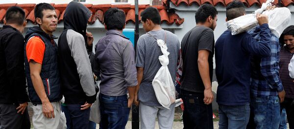 Los migrantes deportados por EEUU en Guatemala - Sputnik Mundo