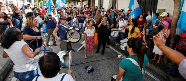 Manifestación contra la política migratoria de Trump en Guatemala - Sputnik Mundo