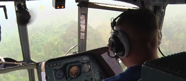 Así combate Rusia los incendios forestales en Siberia - Sputnik Mundo