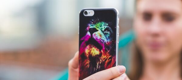 Un teléfono - Sputnik Mundo