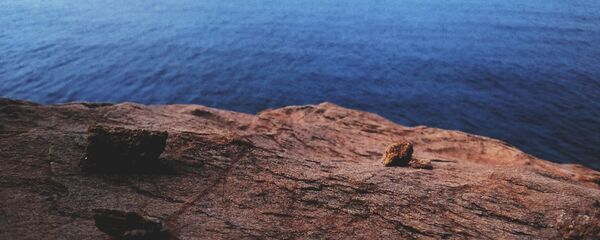 Un acantilado (imagen referencial) Un acantilado (imagen referencial) - Sputnik Mundo