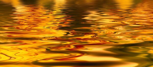 Líquido dorado - Sputnik Mundo