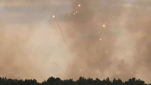 Incendio de municiones en un arsenal en la región rusa de Krasnoyarsk Incendio de municiones en un arsenal en la región rusa de Krasnoyarsk - Sputnik Mundo