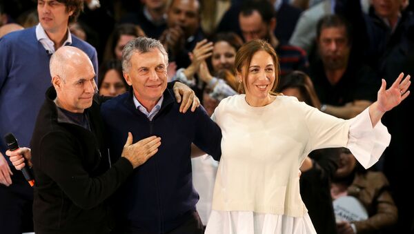 El presidente argentino Mauricio Macri junto a la gobernadora de la provincia de Buenos Aires María Eugenia Vidal y el jefe de Gobierno porteño, Horacio Rodríguez Larreta - Sputnik Mundo