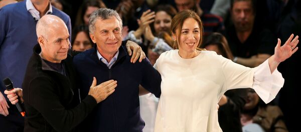 El presidente argentino Mauricio Macri junto a la gobernadora de la provincia de Buenos Aires María Eugenia Vidal y el jefe de Gobierno porteño, Horacio Rodríguez Larreta - Sputnik Mundo