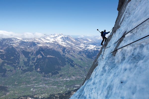 Quince escalofriantes fotos de escalada a las cimas más altas del planeta - Sputnik Mundo