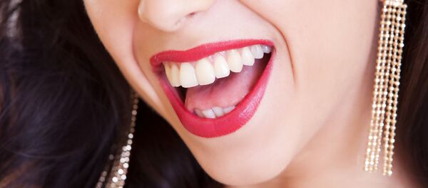 Una sonrisa de una mujer - Sputnik Mundo