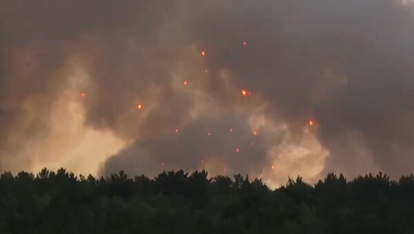 Incendio en un almacén de municiones en la provincia rusa de Krasnoyarsk (Siberia) - Sputnik Mundo