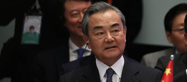 Wang Yi, ministro de Exteriores de China - Sputnik Mundo