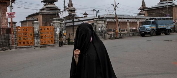 Una mujer musulmana en Cachemira - Sputnik Mundo