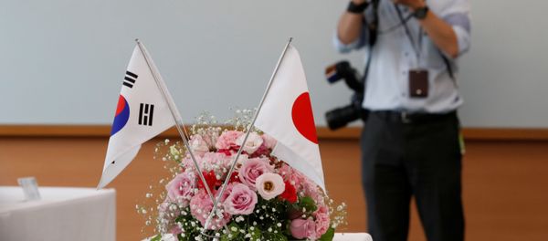 Banderas de Corea del Sur y Japón - Sputnik Mundo