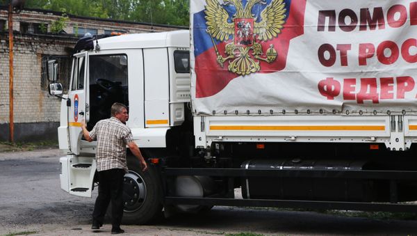 La llegada de un convoy humanitario ruso a Donetsk La llegada de un convoy humanitario ruso a Donetsk - Sputnik Mundo