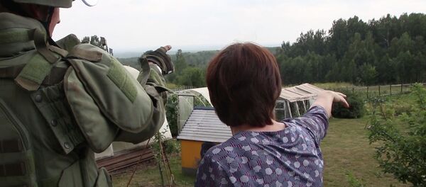 Los zapadores militares revisan la zona de la explosión en Áchinsk, Rusia - Sputnik Mundo