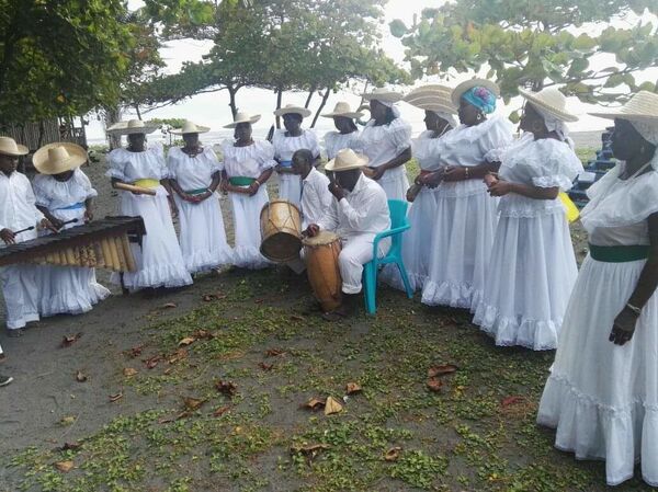 Mujeres afrocolombianas cantan contra la violencia en el Pacífico Sur Mujeres afrocolombianas cantan contra la violencia en el Pacífico Sur - Sputnik Mundo
