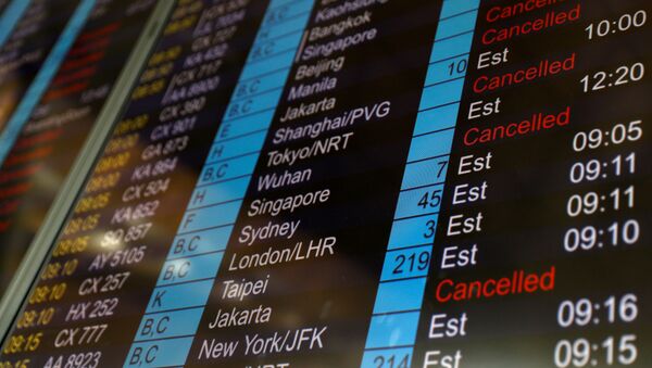 Tabla de salidas del aeropuerto de Hong Kong - Sputnik Mundo