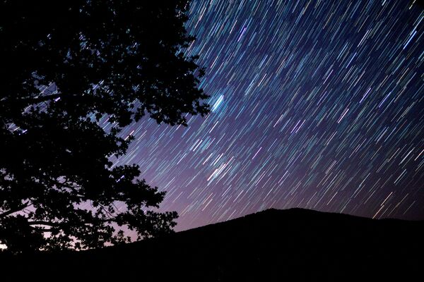 Perseidas: el bello espectáculo que nos trajo la lluvia de estrellas  - Sputnik Mundo