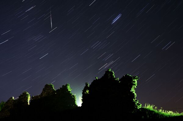 Perseidas: el bello espectáculo que nos trajo la lluvia de estrellas  - Sputnik Mundo