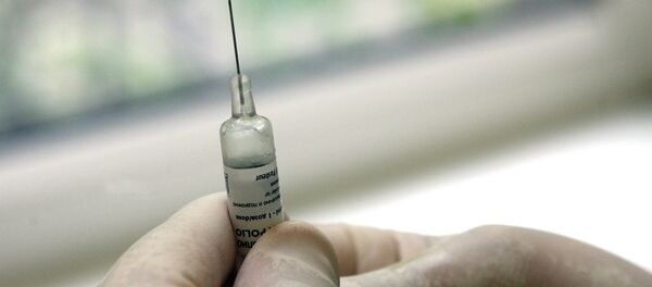 Una vacuna - Sputnik Mundo