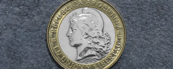 Peso argentino (imagen referencial) - Sputnik Mundo