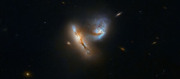 El dúo dos galaxias UGC 2369 se toca por primera vez El dúo dos galaxias UGC 2369 se toca por primera vez - Sputnik Mundo