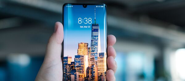 Un teléfono de Huawei Un teléfono de Huawei - Sputnik Mundo