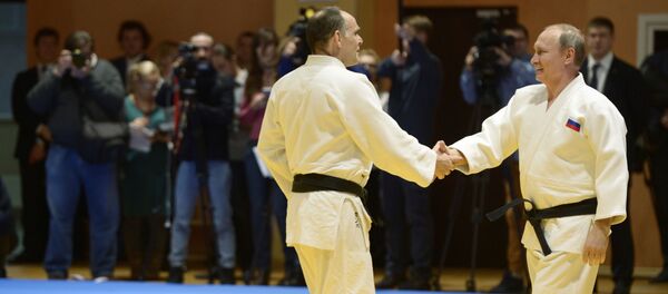 El entrenador de la selección rusa de judo Ezio Gamba y el presidente de Rusia, Vladímir Putin - Sputnik Mundo