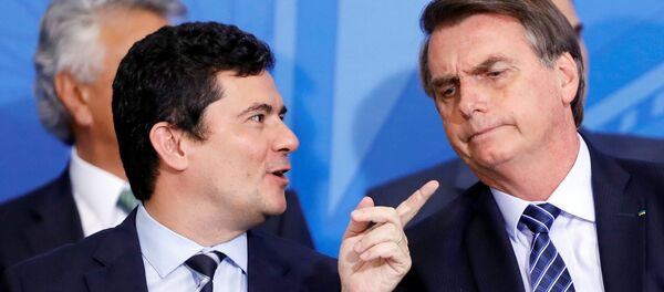 El ministro de Justicia de Brasil Sergio Moro y el presidente brasileño Jair Bolsonaro - Sputnik Mundo