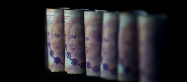 Los pesos argentinos - Sputnik Mundo