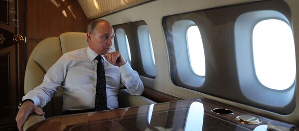 Vladímir Putin a bordo del avión presidencial - Sputnik Mundo