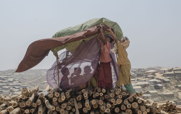 Una de las fotos ganadoras del gran premio del concurso Andréi Stenin. Serie 'Los miserables y tierra' por Gabriele Cecconi, Italia - Sputnik Mundo