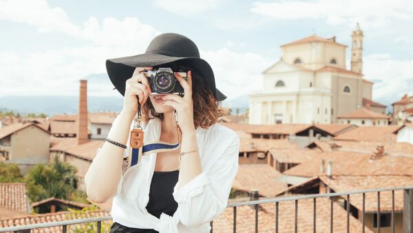 Una turista - Sputnik Mundo