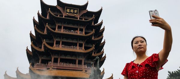 Turistas chinos (imagen referencial) Turistas chinos (imagen referencial) - Sputnik Mundo