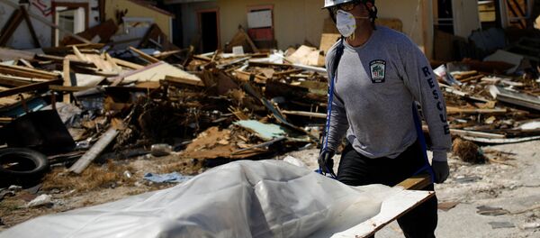 Una víctima del huracán Dorian en Bahamas - Sputnik Mundo