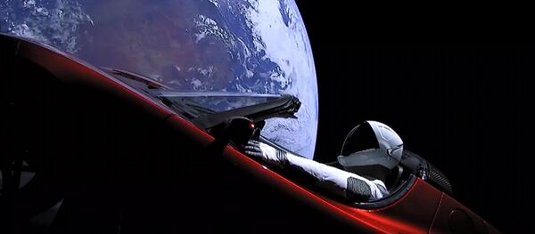 El auto Tesla en la órbita terrestre (archivo) - Sputnik Mundo