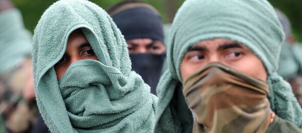 Miembros del grupo paramiltiar colombiano 'Los Rastrojos' - Sputnik Mundo