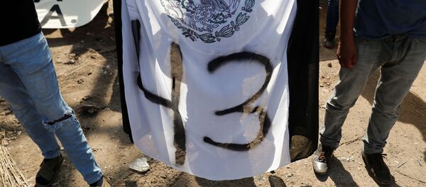 Manifestación por los cinco años de la desaparición forzada de los 43 estudiantes de Ayotzinapa - Sputnik Mundo