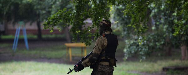 Un combatiente de de las Fuerzas de Seguridad de la República Popular de Donetsk Un combatiente de de las Fuerzas de Seguridad de la República Popular de Donetsk - Sputnik Mundo