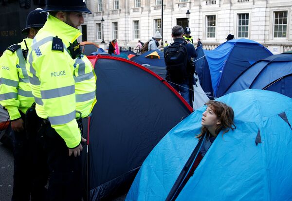 Las multitudinarias protestas contra el cambio climático recorren el planeta - Sputnik Mundo