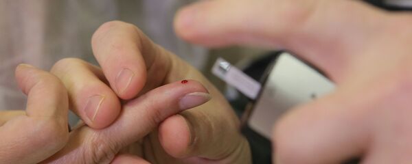 Glucómetro para diagnosticar diabetes - Sputnik Mundo
