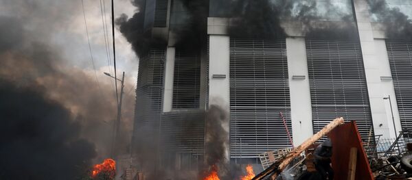 La Contraloría General de Ecuador afectada por un incendio - Sputnik Mundo