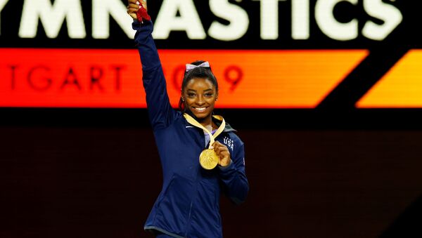 Simone Biles, gimnasta estadounidense - Sputnik Mundo