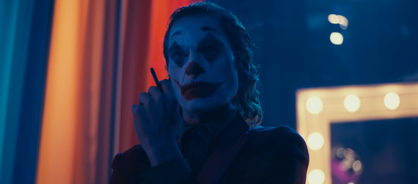El actor Joaquin Phoenix en el papel del personaje Guasón —Joker— - Sputnik Mundo