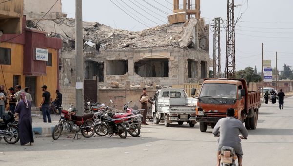 La ciudad siria Tal Abiad tras los ataques turcos La ciudad siria Tal Abiad tras los ataques turcos - Sputnik Mundo