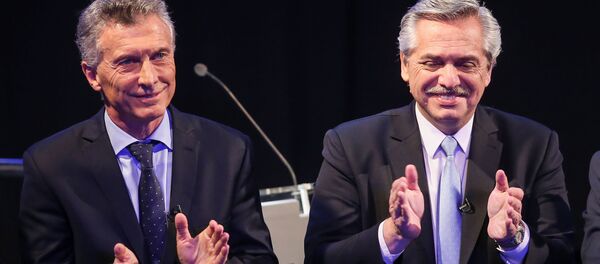 El presidente argentino Mauricio Macri y el candidato opositor Alberto Fernández - Sputnik Mundo