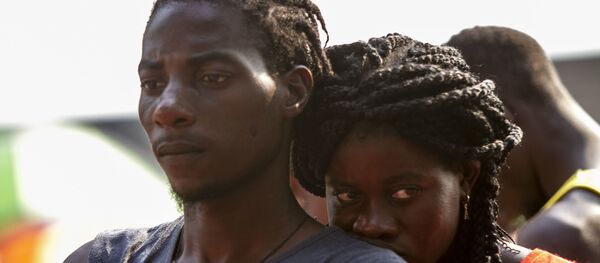 Haitianos fuera de la Estación migratoria Siglo XXI de Tapachula, Chiapas, en abril de 2019 - Sputnik Mundo