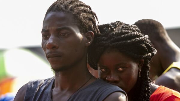 Haitianos fuera de la Estación migratoria Siglo XXI de Tapachula, Chiapas, en abril de 2019 - Sputnik Mundo