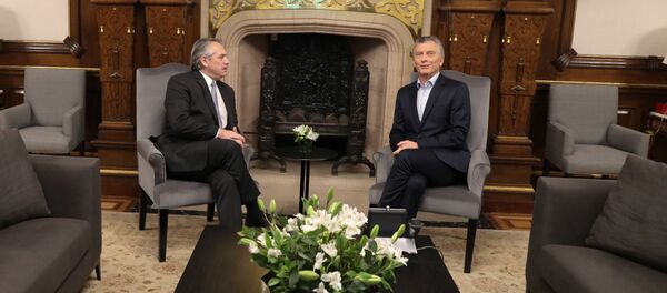 El presidente argentino, Mauricio Macri, se reune con el presidente electo, Alberto Fernández, en la Casa Rosada - Sputnik Mundo