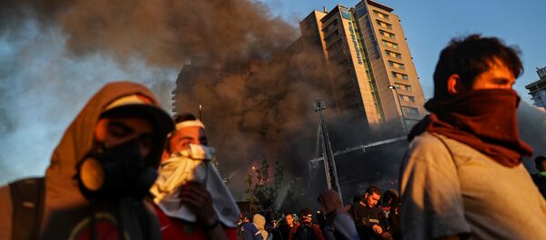 Protestas en Santiago, Chile - Sputnik Mundo