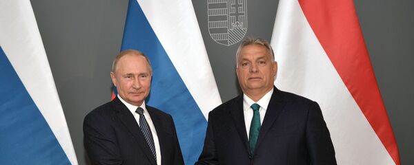 El presidente de Rusia, Vladímir Putin, y el primer ministro de Hungría, Viktor Orban - Sputnik Mundo
