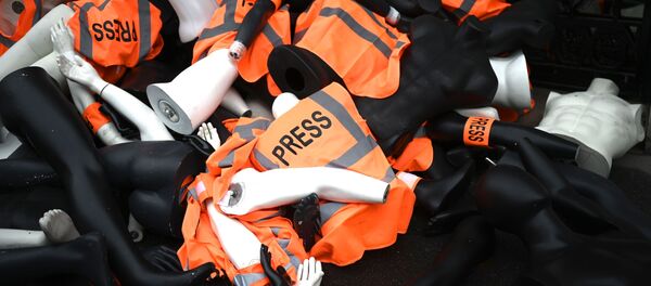 Una acción de protesta para conmemorar el primer aniversario del asesinato del periodista saudí Jamal Khashoggi - Sputnik Mundo